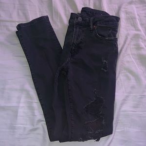 Blacked out skinny jeans (distressed)